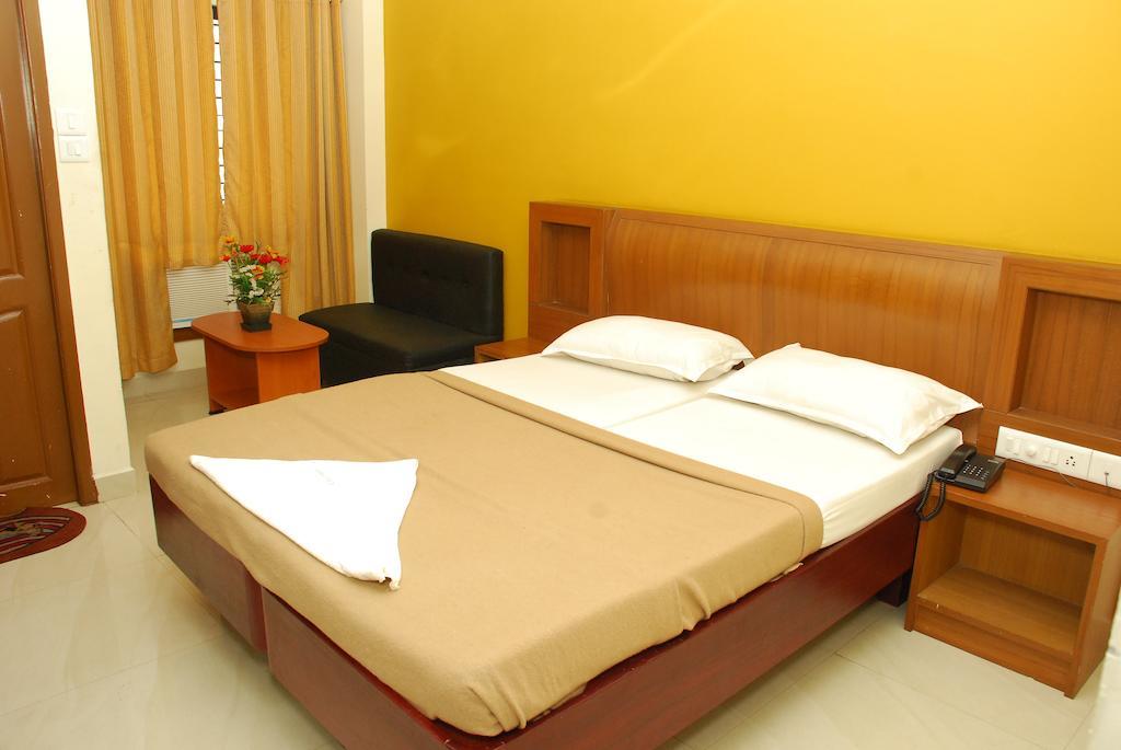 City Manor Hotel Csennai Szoba fotó