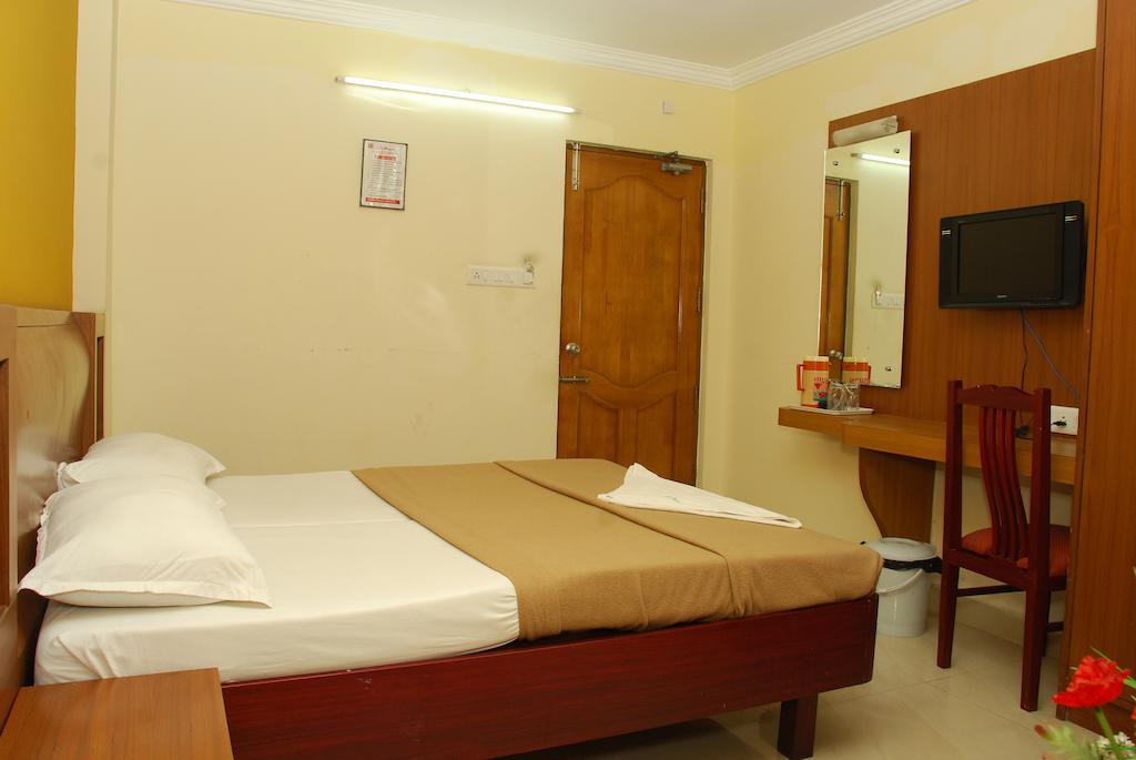 City Manor Hotel Csennai Szoba fotó